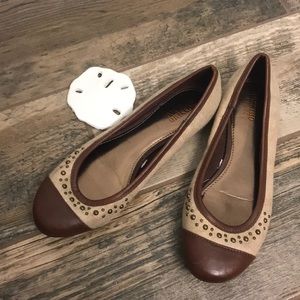 Tan and brown flats
